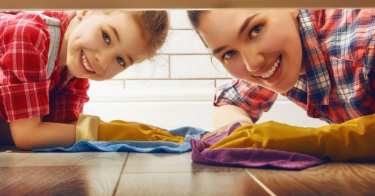 Daughter and Mom Cleaning floor